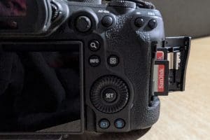 Back of a mirrorless camera displaying two Sandisk SD cards, ready for capturing and storing memories.